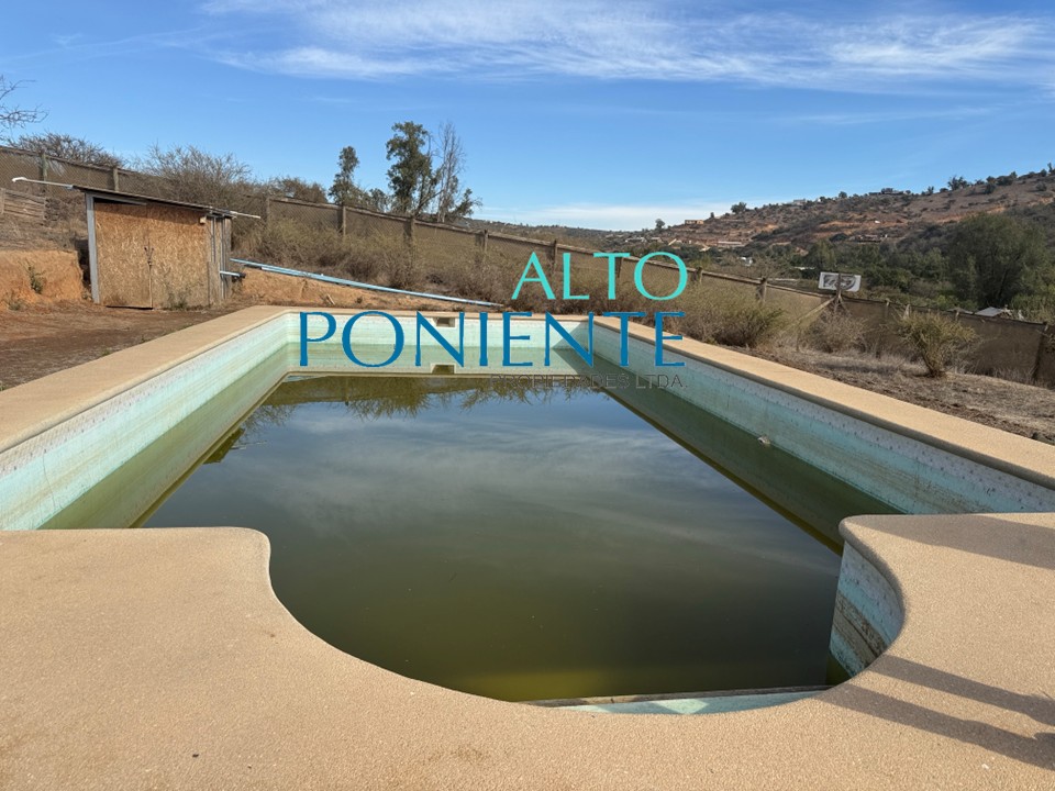PARCELA CON PISCINA, QUINCHO Y CABAÑA EN LAS MELLIZAS, LIMACHE.